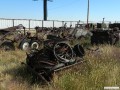 A pile of rims in the foreground